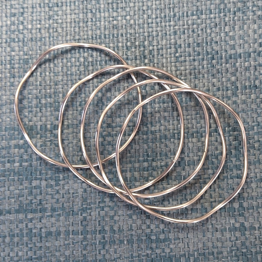 5 wavy bangle bracelets silver tone approximately 2 3/4" wide